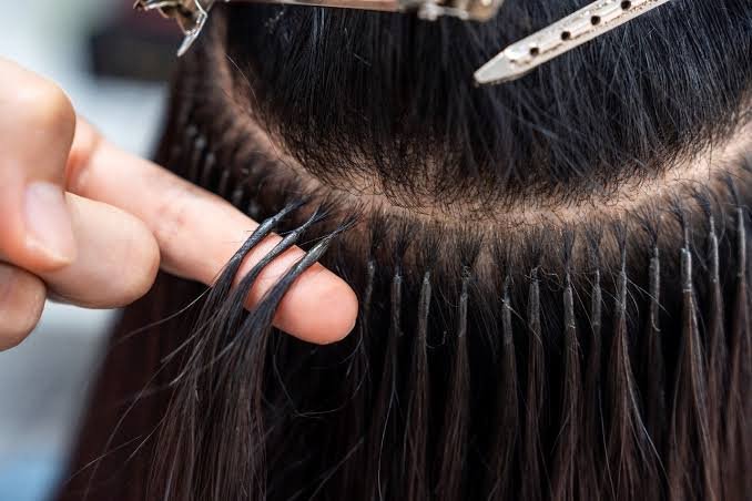 Glue hair extensions application near you in Delhi