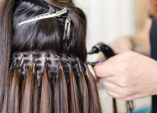 Glue hair extensions near you in Delhi at Aesthetics Mirror Glam Studio